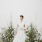 Impressive made-to-order wedding dress with flying skirt and pleated ruffle detail on top - D1603