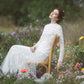 Made-to-order elegant lace wedding dress with crew neck, long sleeve, and detachable tulle skirt - D1536