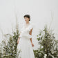 Impressive made-to-order wedding dress with flying skirt and pleated ruffle detail on top - D1603