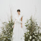 Impressive made-to-order wedding dress with flying skirt and pleated ruffle detail on top - D1603