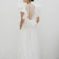 Impressive made-to-order wedding dress with flying skirt and pleated ruffle detail on top - D1603